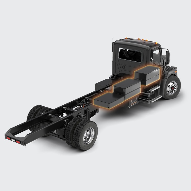 A black truck with a rectangular body Description automatically generated